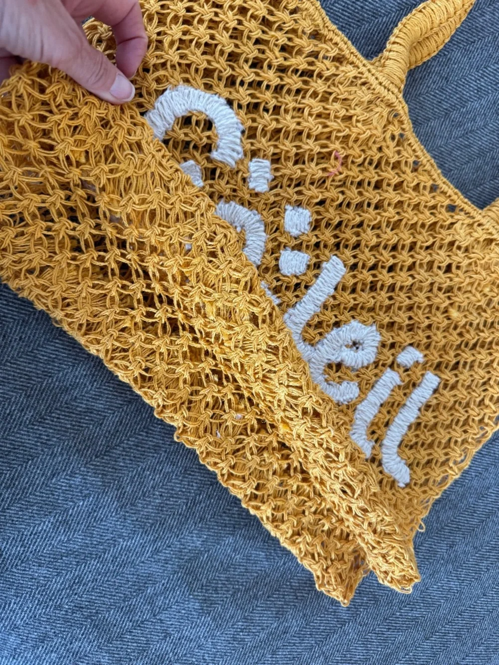 NWOT, RAFFIA WOVEN TOTE WITH DARLING “SOLEIL”